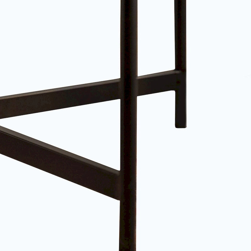 Table basse ronde au design moderne avec piètement en métal croisé