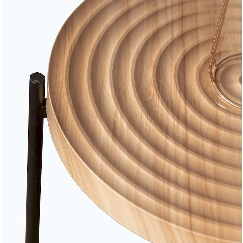 Table basse ronde au design moderne avec piètement en métal croisé