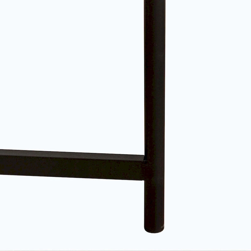 Table basse ronde au design moderne avec piètement en métal croisé